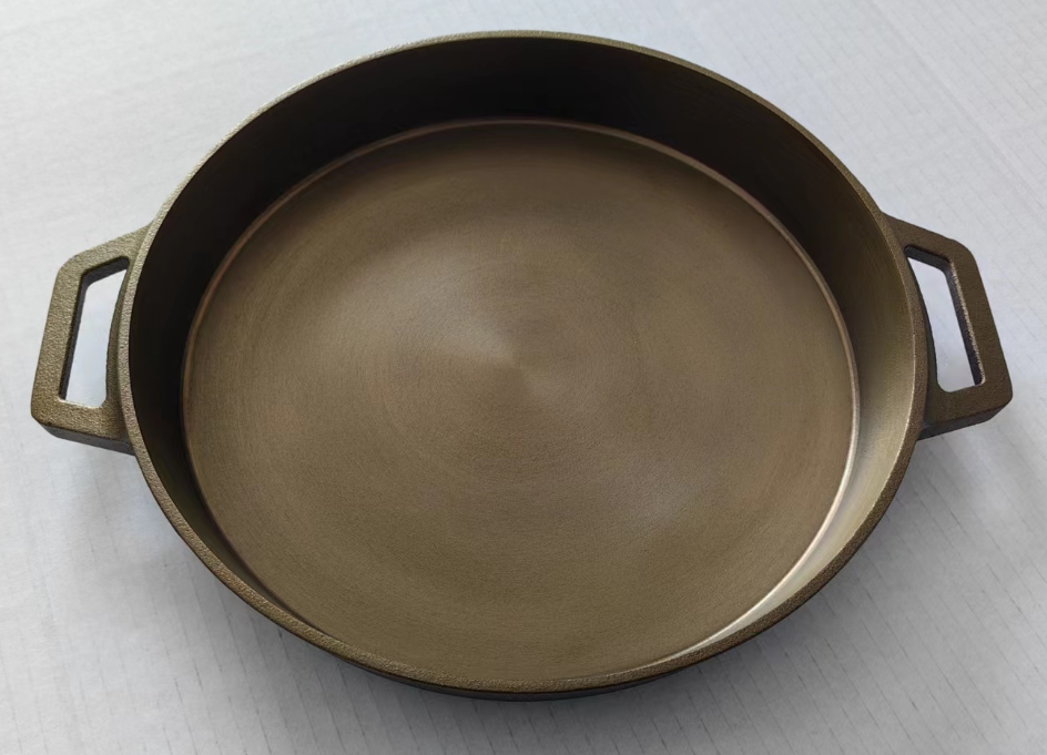 Golden cast iron pan